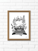 Black and white illustration of a typewriter surrounded with botanicals. The message reads "anthophile." Pair your prints with other illustrations to create a whimsical story of your own.