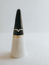 Store and display your favourite rings with this Black Tip ring cone. It's such a beautiful addition to your space, adding a touch magic! Made with air dry clay, painted with black and gold acrylic paint and sealed with a high gloss coating to make it water resistant.