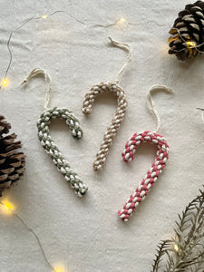 Macrame candy cane Christmas tree ornaments in different colour options. Green and white, pink and white, or jute and white. Sold in sets of three as well. So charming and sweet. Cotton rope is hand-dyed and braided to form a spiral design which is then bent into a candy shape.