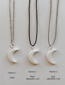 Crescent Moon clay pendants with option of a chain, black adjustable cord or grey adjustable cord