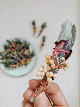 Mini floral smudge sticks with sage, lavender, rose petals and fynbos flowers.