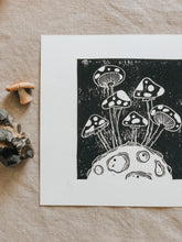 Ahhh mushrooms... so weird but so amazing! The process starts with a paper drawing that is then transferred to a Lino sheet and carefully hand carved by me, using special tools. Once the carving work is done, a water-based ink is rolled onto the print and then printed onto a sheet of paper. The outcome is rather charming! This print is quirky and fun and can be framed, pegged to a line/meshboard, or sent as a gift to a friend.
