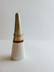 Store and display your favourite rings with this Gold Tip ring cone. It's such a beautiful addition to your space, adding a touch magic! Made with air dry clay, painted with acrylic gold paint and sealed with a high gloss coating to make it water resistant.