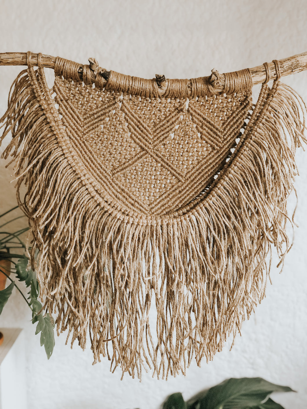 Decorate your space with this safari/rock inspired wall hanging. Made with jute twine on a treated piece of driftwood foraged in Cape Town. It's the perfect addition to an entrance hallway, a bedroom or dinning room area. Hang it in a well lit area surround with some house plants.