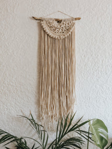 A beautiful half moon design using 3mm cotton rope on a small treated piece of driftwood. Perfect for an office or entrance hallway.