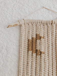 This charming little wall hanging uses two different coloured ropes and sennets of square knots to create an image of a crescent moon.  Made on a treated piece of driftwood foraged in Cape Town.