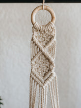 A fun diamond design plant hanger that you can't go wrong with. Made with chunky cotton rope on an untreated wooden hoop. 