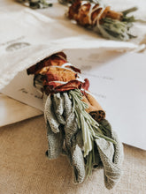 Smudging is an ancient ritual practiced by indigenous people, that involves the burning of medicinal or sacred plants to dispel negativity and raise vibrations. Each bundle contains sage, rosemary, cinnamon, rose petals and is carefully handmade by myself with fresh herbs, foraged flowers and natural cotton rope.