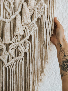 Tiva meaning "Dance" in Native American. A playful hanging with the tassels drawing the eye into the centre of this layered design. Made with single twist cotton rope on a beautiful piece of driftwood foraged in Cape Town. Perfect bohemian addition to an entrance hallway, a bedroom, dinning room or office space.