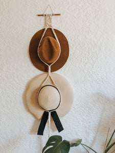 We all have a favourite hat (or two...) but nowhere to store them, so hang them in style when they're not in use with this chic boho macrame hat hanger. It's decor and practicality all in one! Made on a dowel rod.