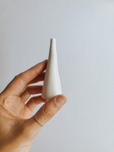 Store and display your favourite rings with this simple white ring cone. It's such a beautiful addition to your space. Made with air dry clay and sealed with high gloss coating to make it water resistant.