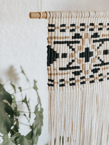 This wall hanging is inspired by the beautiful tapestry patterns of the Native American culture. Made with natural cotton rope, black cotton rope and jute twine, this color combination is earthy and neutral which gives it a cool bohemian vibe and fits in with any colour scheme. 