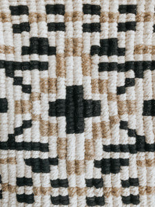 This wall hanging is inspired by the beautiful tapestry patterns of the Native American culture. Made with natural cotton rope, black cotton rope and jute twine, this color combination is earthy and neutral which gives it a cool bohemian vibe and fits in with any colour scheme. 