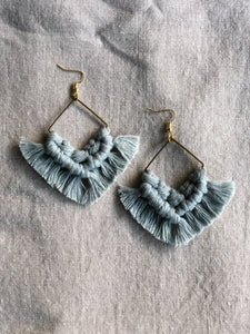 Hand-dyed dusty blue macrame earrings with bronze square charm and gold-plated earring hooks.