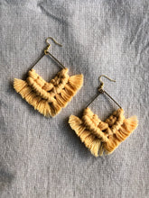Hand-dyed sunshine orange macrame earrings with bronze square charm and gold-plated earring hooks.