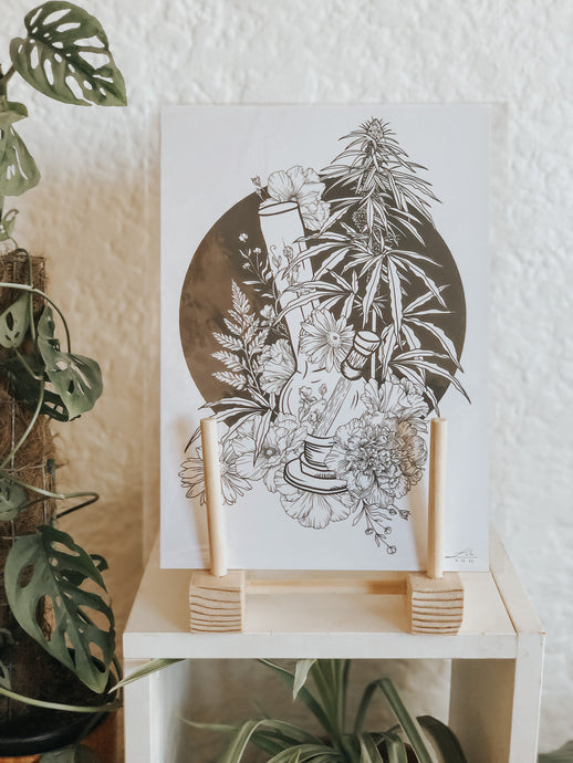 Black and white illustration of a bong surrounded by a cannabis plant and botanicals with black background. Simply download, print, frame and enjoy!
