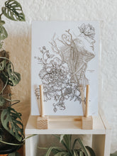 Black and white illustration of botanicals and human anatomy. Pair your prints with other illustrations to create a whimsical story of your own.