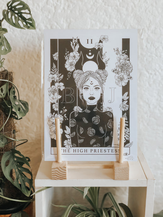 Black and white illustration of The High Priestess Tarot Card surrounded with botanicals. Pair your prints with other illustrations to create a whimsical story of your own.