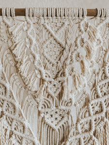 Miri macrame wall hanging. It's a fun multi-layered piece with it's unravelled fringe. A beautiful addition to any space.