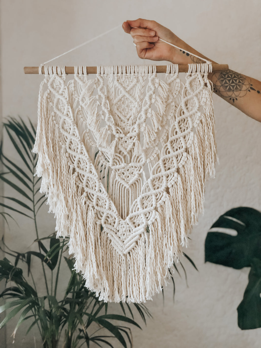 Miri macrame wall hanging. It's a fun multi-layered piece with it's unravelled fringe. A beautiful addition to any space.