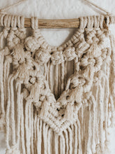 A small sweet and charming wall hanging that can instantly add some interest to that small space you have no idea what to do with. Pair it with some framed family photos or our art prints and create a truly unique wall that will make you feel good every time you walk past it. Made with single twist cotton rope on a treated piece of wood foraged in Cape Town.